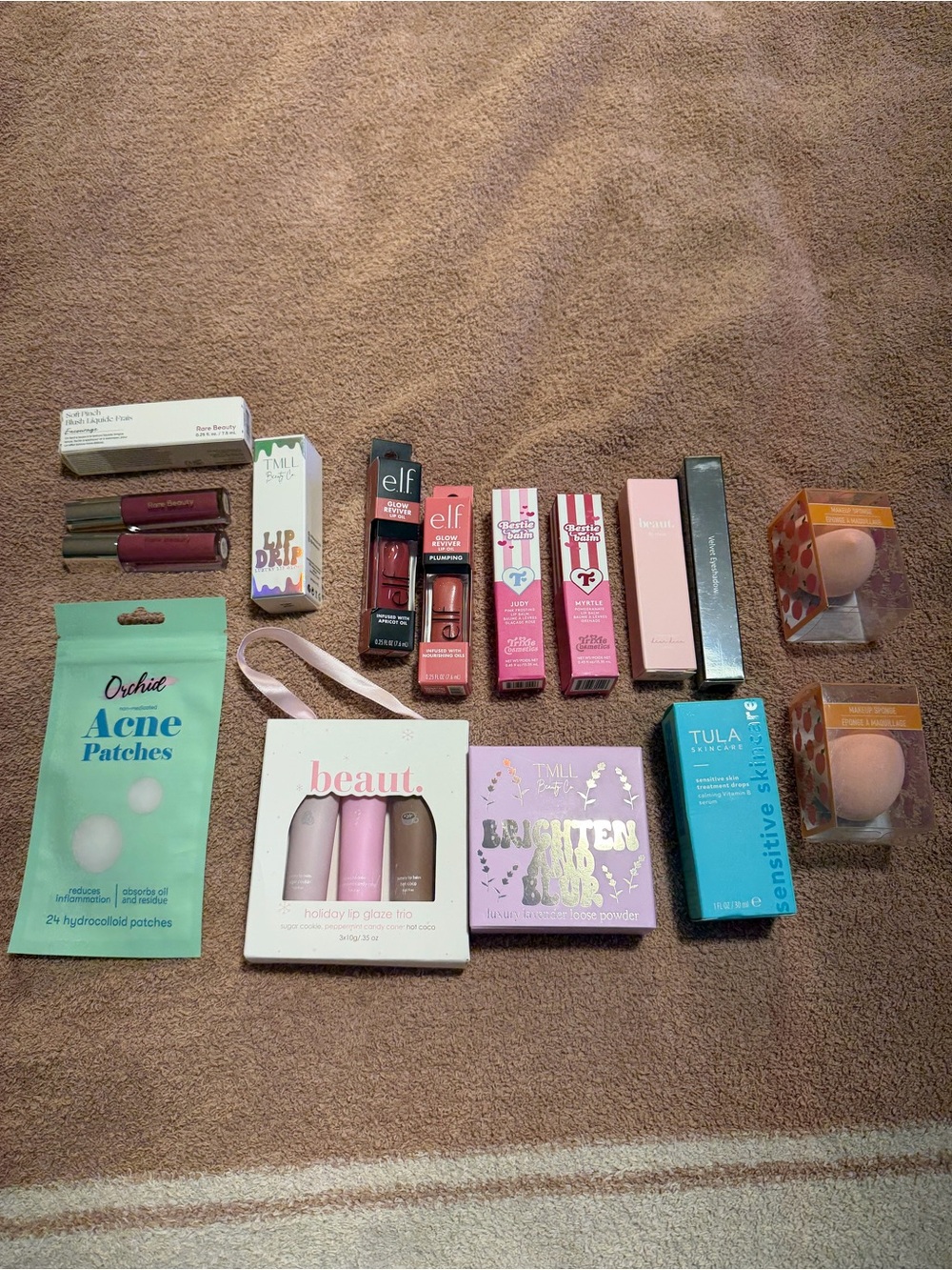 Makeup and Skin Care lot featuring Rare Beauty, ELF, Trixie Cosmetics, Tula, etc
